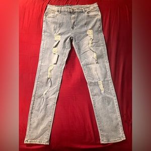 Light blue ripped jeans